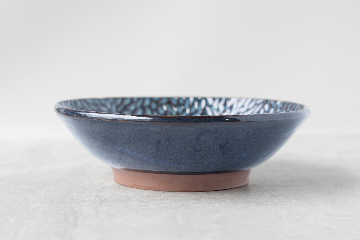 Deep Water Botanical Carved Bowl